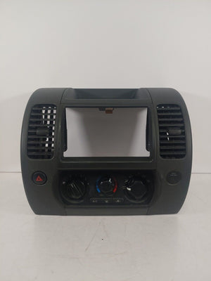 2005-12 NISSAN XTERRA PATHFINDER OEM FRONT AC CLIMATE SWITCH CONTROL RADIO BEZEL